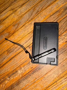 Nintendo Switch Block with joy-con strap.